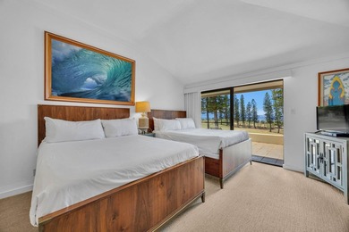 Ocean and fairway views from this beautifully upgraded unit with - photo 9