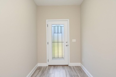 As you step inside, you are greeted with an open floor plan that - photo 5