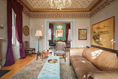 Wake to sunlight streaming thru tall windows as the house stirs - photo 5