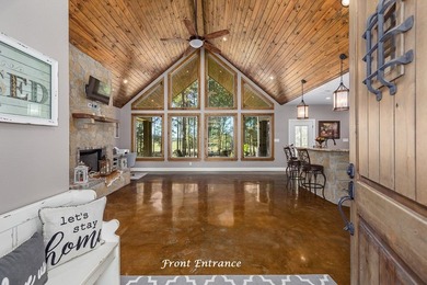 Experience peaceful waterfront living with this custom-built - photo 4