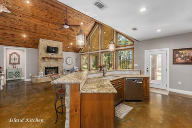 Experience peaceful waterfront living with this custom-built - photo 6