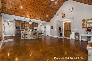 Experience peaceful waterfront living with this custom-built - photo 7