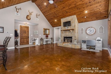 Experience peaceful waterfront living with this custom-built - photo 8