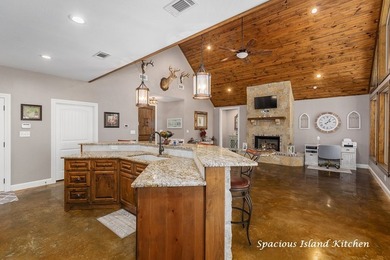 Experience peaceful waterfront living with this custom-built - photo 10
