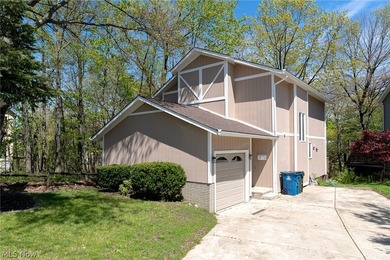 This late 20th-century, three-story contemporary residence - photo 1
