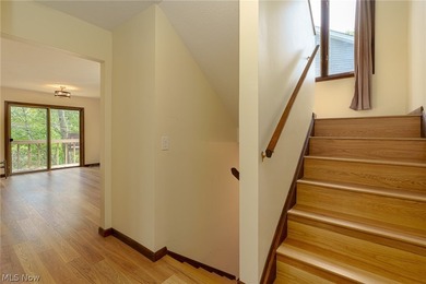 This late 20th-century, three-story contemporary residence - photo 9