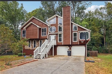 Welcome to this spacious 4-bedroom, 3-bathroom home in - photo 1