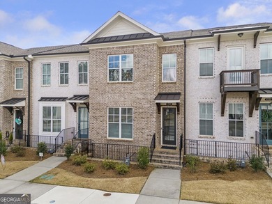 Welcome to this beautifully upgraded three-level townhouse