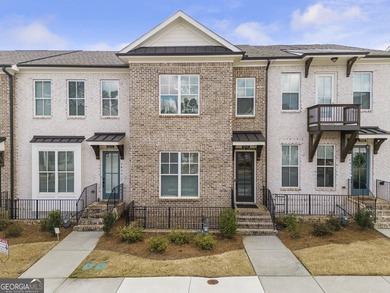 Welcome to this beautifully upgraded three-level townhouse