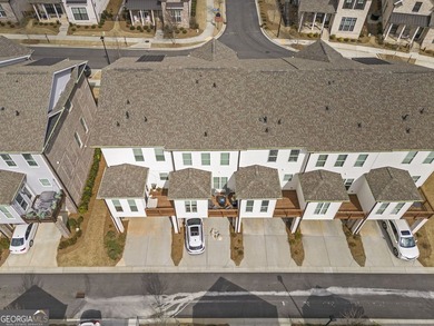 Welcome to this beautifully upgraded three-level townhouse