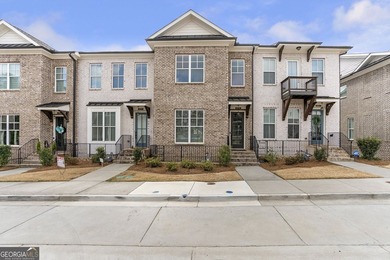 Welcome to this beautifully upgraded three-level townhouse