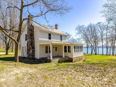 Set along 250 feet of rare, sandy shoreline on Lake Champlain - photo 2