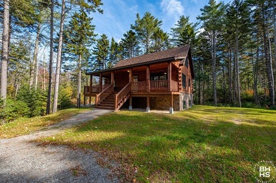 Lake Placid custom new completed log home is being offered for - photo 2