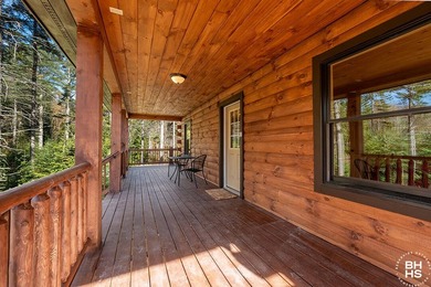 Lake Placid custom new completed log home is being offered for - photo 3