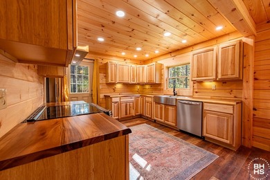 Lake Placid custom new completed log home is being offered for - photo 7
