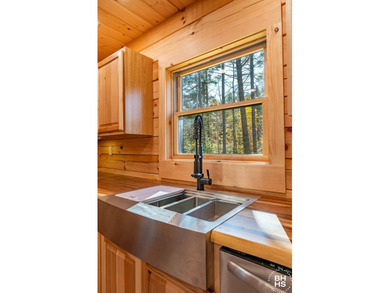 Lake Placid custom new completed log home is being offered for - photo 8