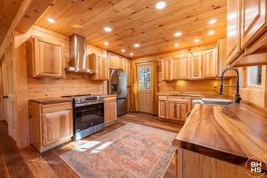 Lake Placid custom new completed log home is being offered for - photo 9
