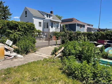Rare waterfront opportunity in Gerritsen Beach! This unique - photo 7