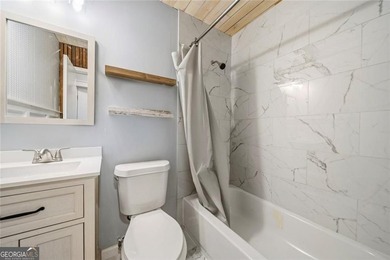 A beautifully maintained home with serene views of Canary Lake - photo 14