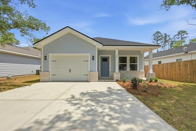 THIS CRAFTSMAN STYLE HOME WILL BE COMPLETED END OF AUGUST, the - photo 1