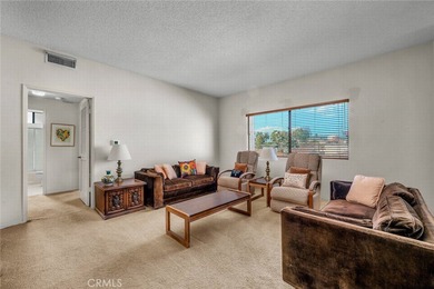 Welcome to this well-maintained top-floor unit located in the