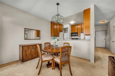 Welcome to this well-maintained top-floor unit located in the