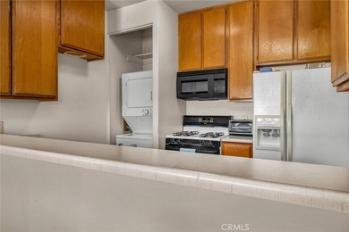 Welcome to this well-maintained top-floor unit located in the