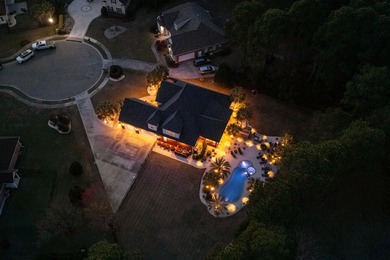 Welcome home to this stunning all-brick residence nestled on a - photo 2