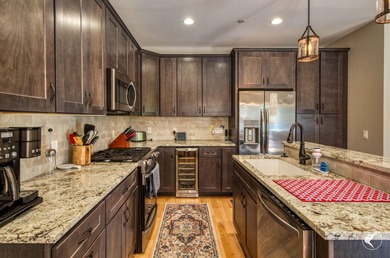 Discover the epitome of Adirondack luxury at The Lodges, the - photo 7
