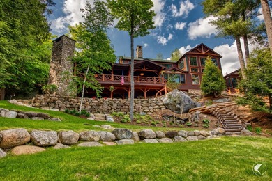Kiwassa Lake Lodge sits above the shoreline in a way that - photo 6