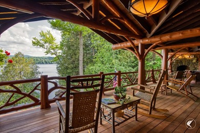 Kiwassa Lake Lodge sits above the shoreline in a way that - photo 10