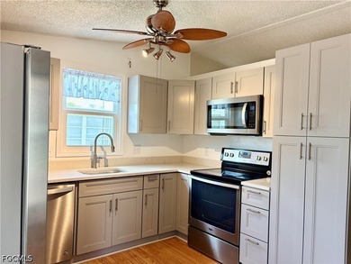 Located in a desirable 55+ community, this well-maintained home - photo 14