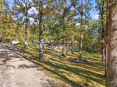 Welcome to 311 Rayburn Blvd, a rare gem tucked into the heart of - photo 2