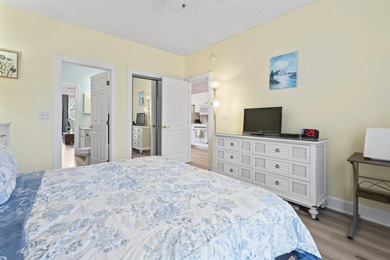 This stunning second-floor 1-bedroom, 1.5-bath condo offers - photo 8