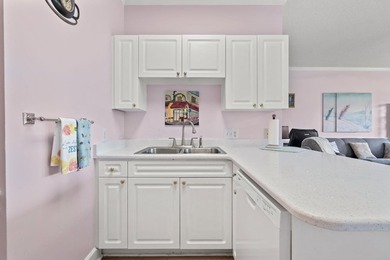 This stunning second-floor 1-bedroom, 1.5-bath condo offers - photo 10