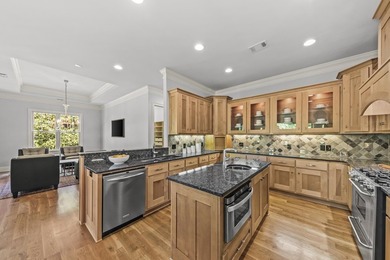 Experience luxury living in this stunning lakefront home nestled - photo 28