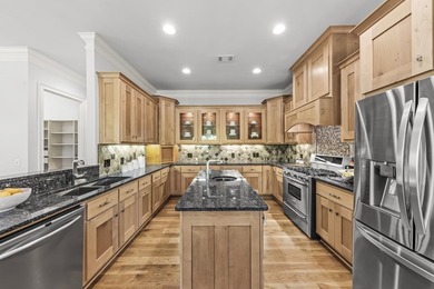 Experience luxury living in this stunning lakefront home nestled - photo 29