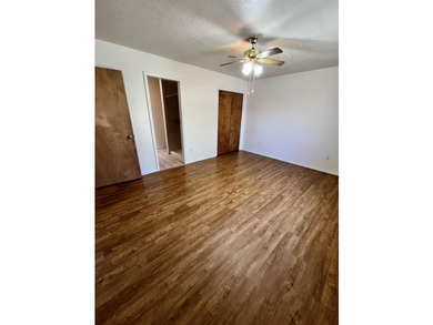 Single story home with backyard access. Freshly painted interior - photo 10