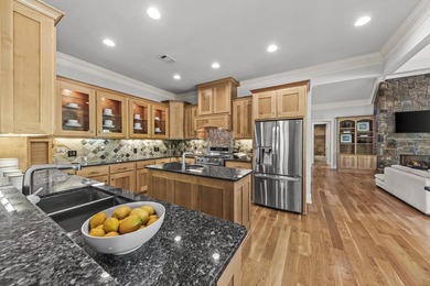 Experience luxury living in this stunning lakefront home nestled - photo 31