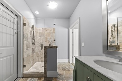 Experience luxury living in this stunning lakefront home nestled - photo 38