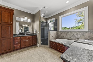 Experience luxury living in this stunning lakefront home nestled - photo 45