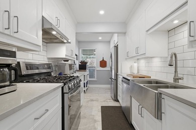 Beautifully renovated end-unit townhome in the highly - photo 12