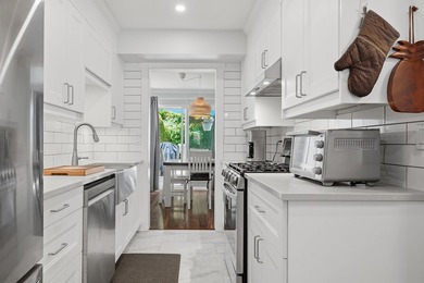 Beautifully renovated end-unit townhome in the highly - photo 15