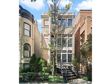 Architecturally distinctive and flooded with natural light, this - photo 1