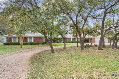 Tucked away on over 2 peaceful acres in the sought-after Woods - photo 4