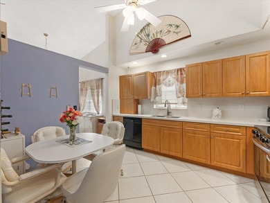 Welcome to this charming three-bedroom, two-bathroom residence - photo 13