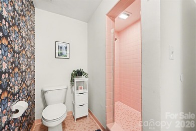 Own a piece of Charlotte history in this unique Mid-Century