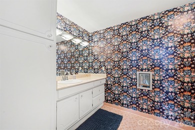 Own a piece of Charlotte history in this unique Mid-Century