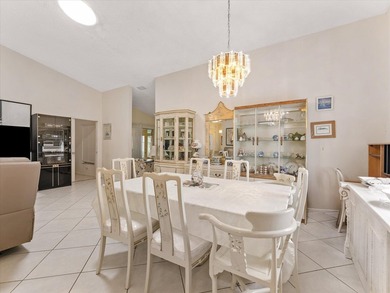 Welcome to this charming three-bedroom, two-bathroom residence - photo 16