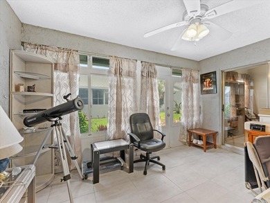 Welcome to this charming three-bedroom, two-bathroom residence - photo 22